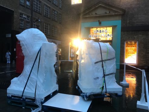 Two Bluewater Forklifts and drivers lifting Ice sculpture at covent Garden, London